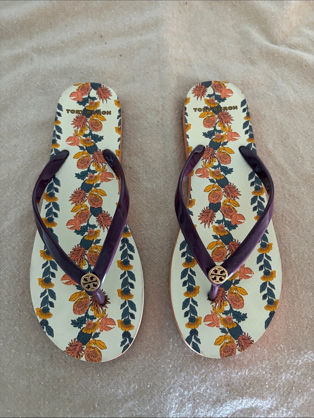 Tory Burch Floral Flip Flops with burgundy Straps and Gold Logo
